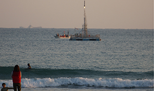 Low-apogee rocket sea launch